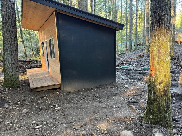 a view of a back yard of the house