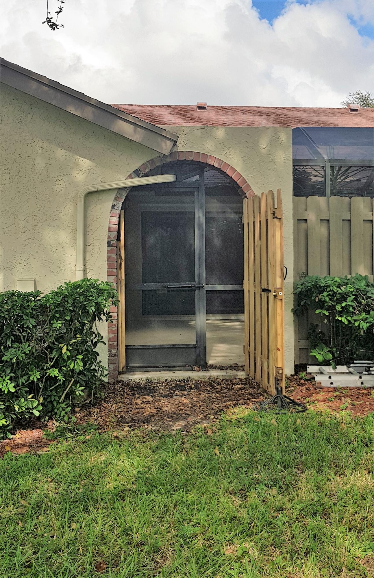 23344 Southwest 55th Way, Unit B Boca Raton, FL 33433 - Photo 30 of 40 Exterior Entrance to Courtyard