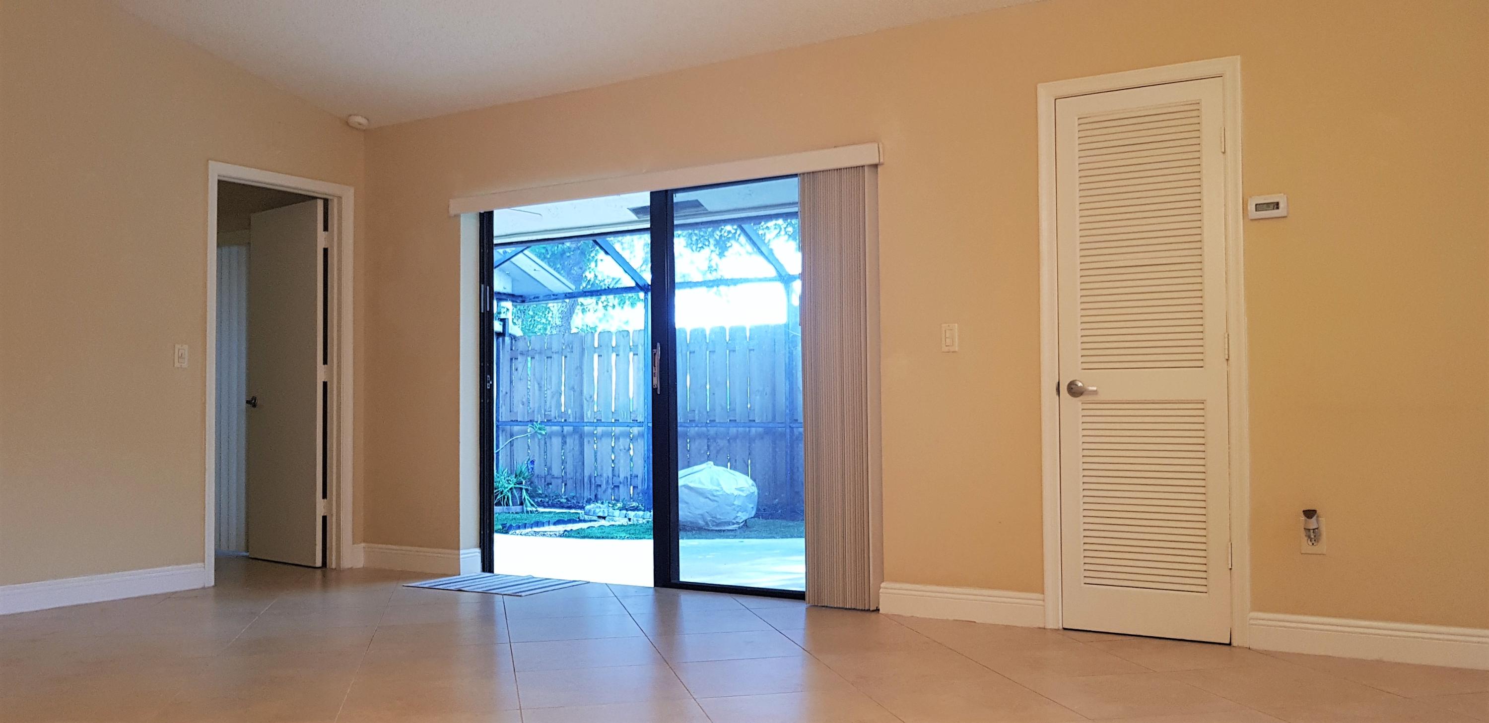 23344 Southwest 55th Way, Unit B Boca Raton, FL 33433 - Photo 7 of 40 Living Room Courtyard View