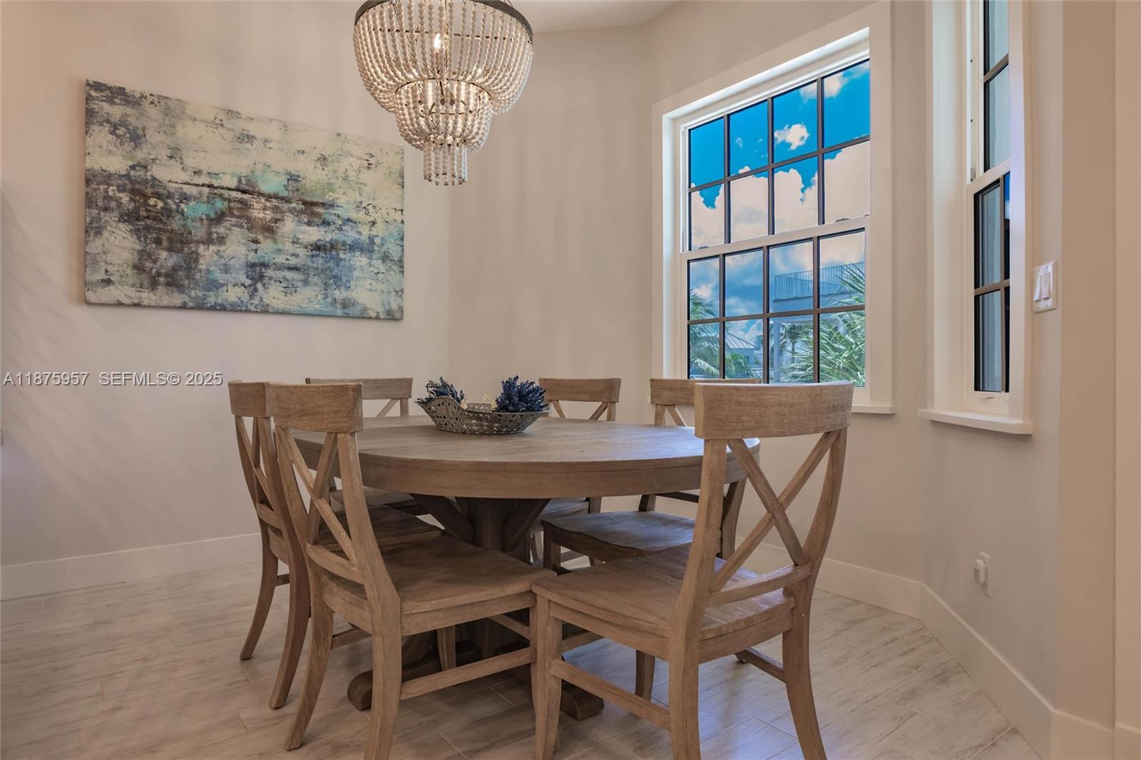 117 Ocean Key Way Jupiter, FL 33477 - Photo 44 of 58 a view of a dining room with furniture and window