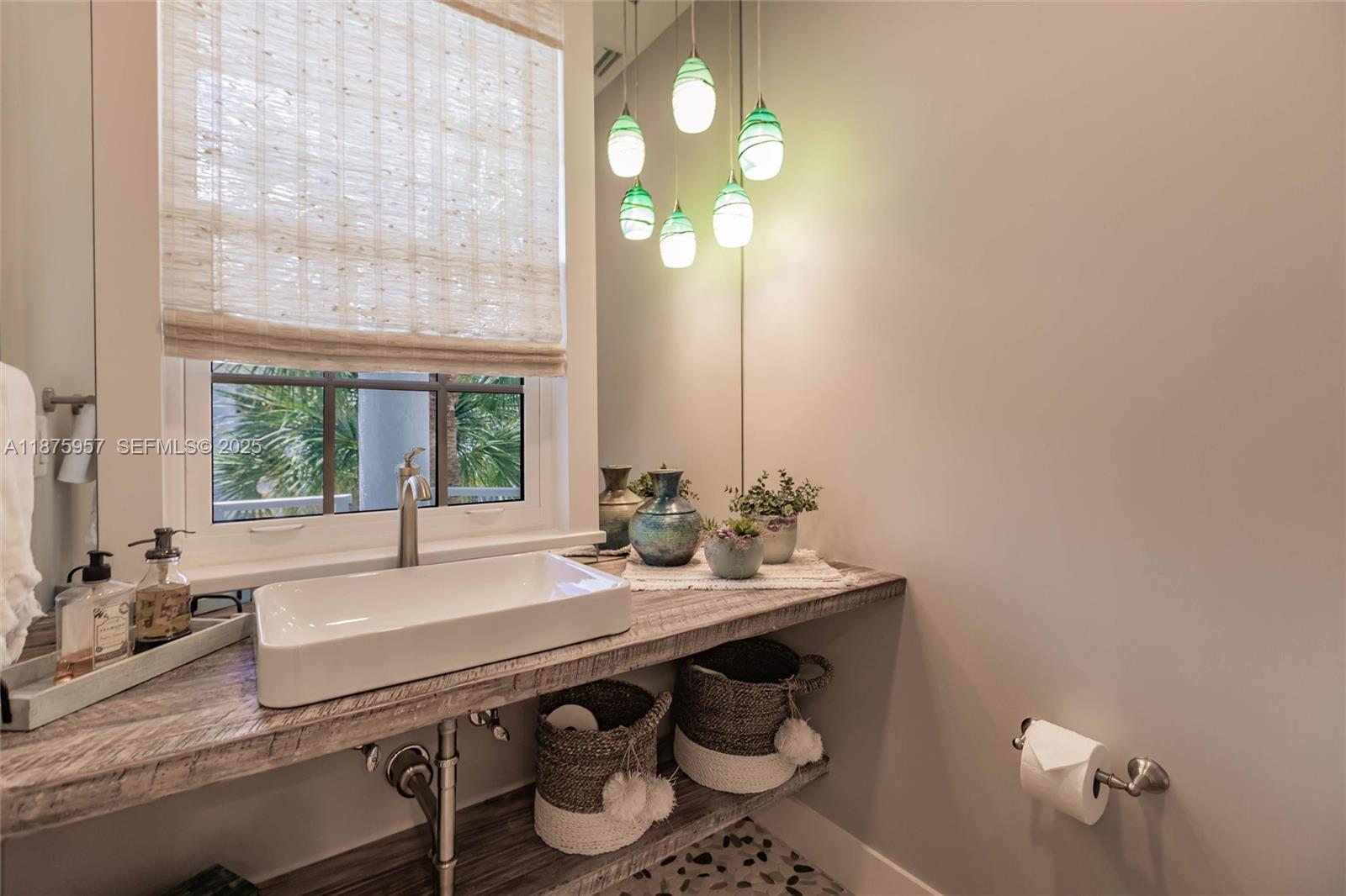 117 Ocean Key Way Jupiter, FL 33477 - Photo 48 of 58 a bathroom with a granite countertop sink a toilet and a window