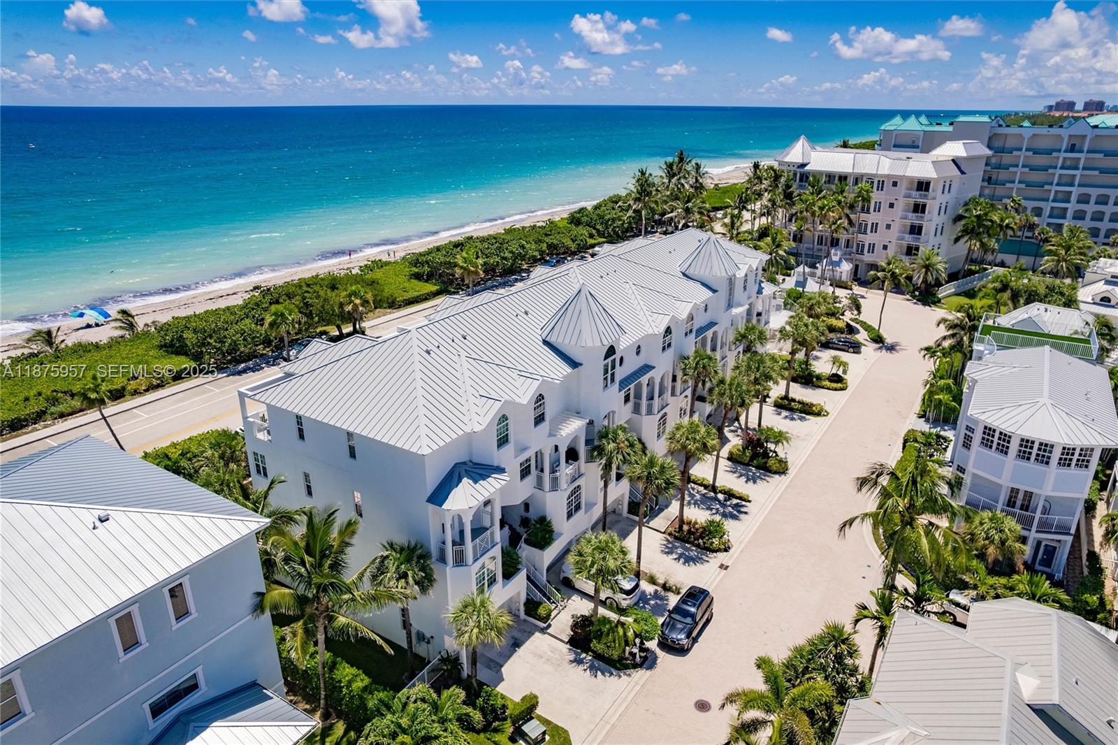 117 Ocean Key Way Jupiter, FL 33477 - Photo 7 of 58 an aerial view of a house with a garden
