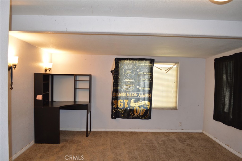 51901 Maxine Avenue Cabazon, CA 92230 - Photo 13 of 25 a view of entryway with a hallway