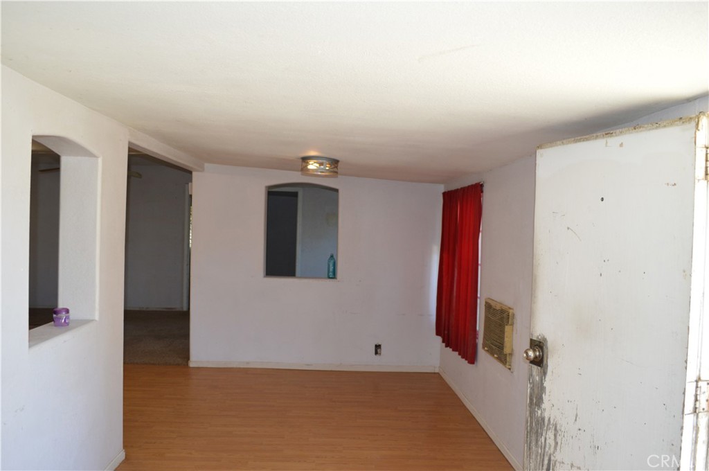 51901 Maxine Avenue Cabazon, CA 92230 - Photo 18 of 25 a view of a room with floor to ceiling window and stairs