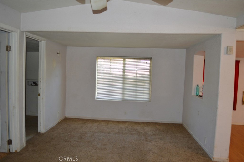 51901 Maxine Avenue Cabazon, CA 92230 - Photo 7 of 25 an empty room with windows