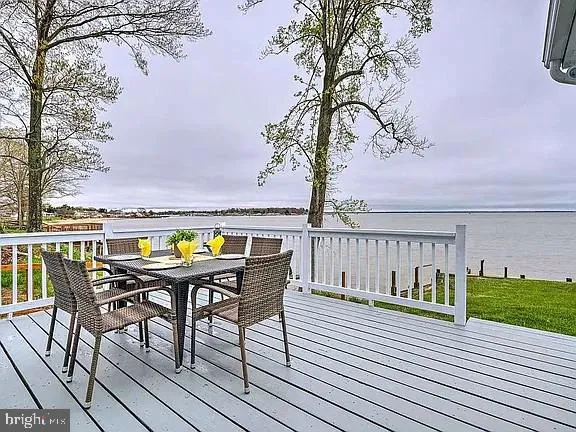 a view of swimming pool with seating space