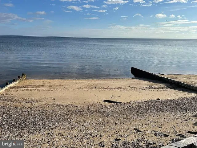 a view of an ocean with beach