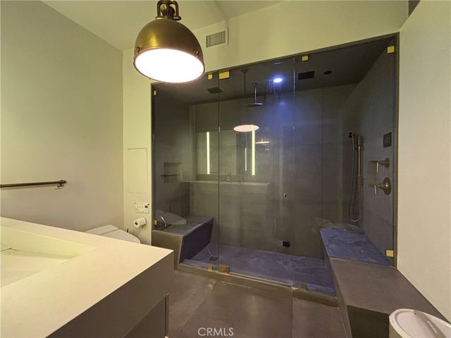a bathroom with a sink and mirror