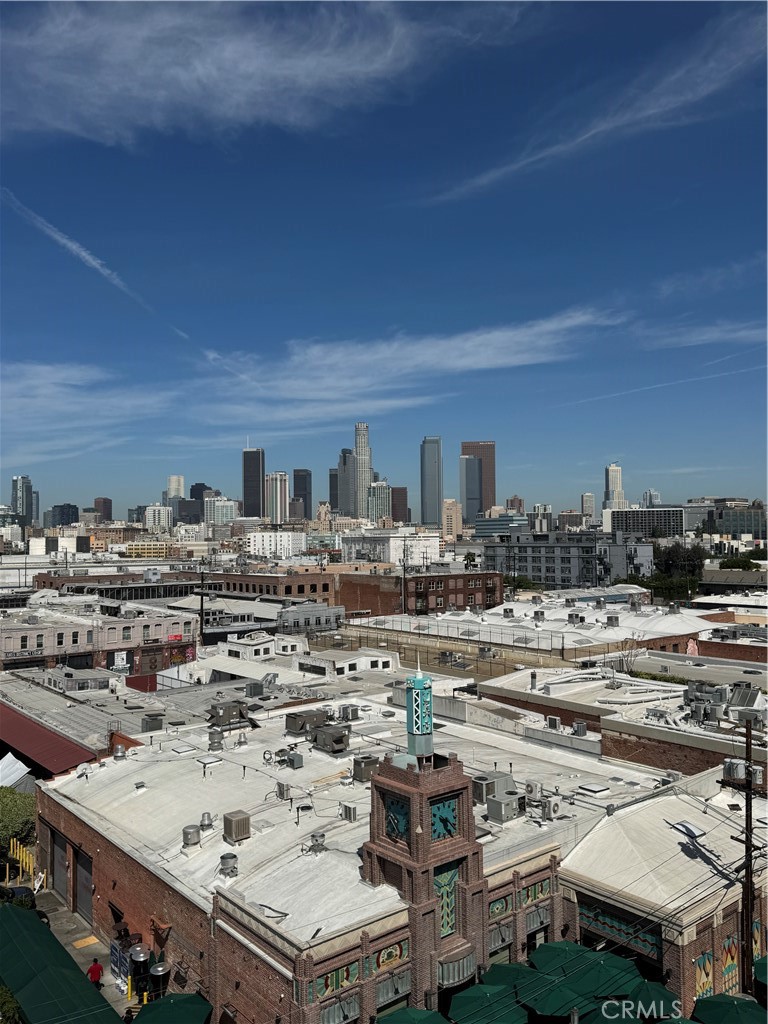 527 Molino Street, Unit 401 Los Angeles, CA 90013 - Photo 27 of 31 a city view with tall buildings