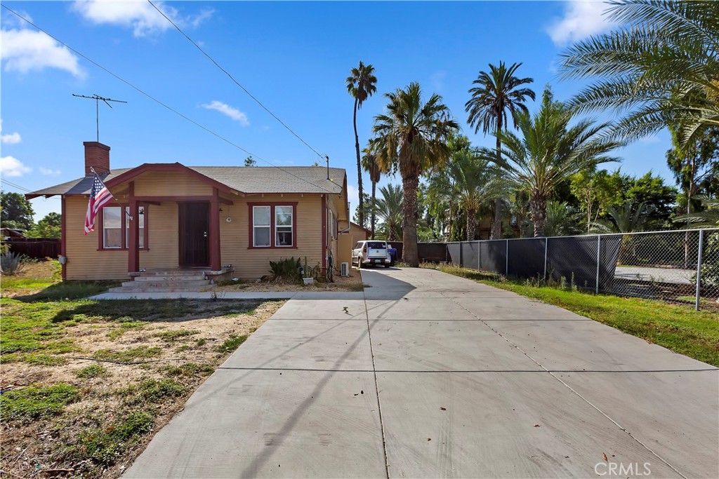 8644 Indiana Avenue Riverside, CA 92504 - Photo 1 of 1 a front view of a house with garden