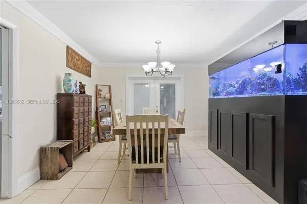 a view of a livingroom with furniture and chandelier