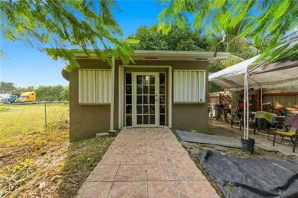 a front view of a house with a porch