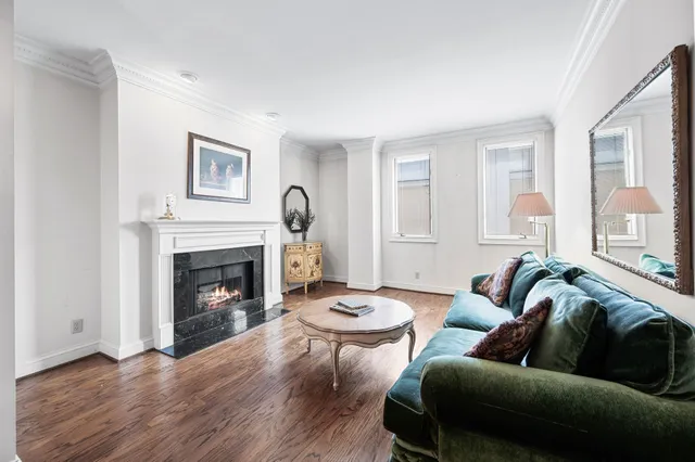 a kitchen with stainless steel appliances a refrigerator sink and cabinets