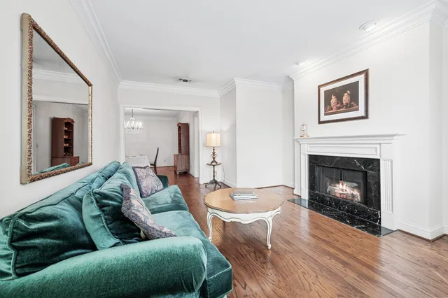 a kitchen with a stove and a white cabinets