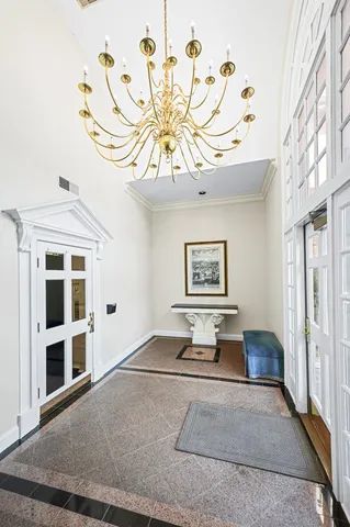 a living room with furniture and natural light