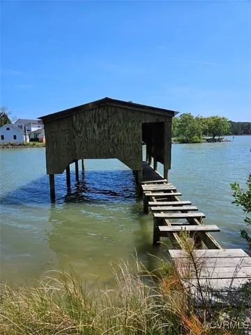a view of a balcony with chair and table