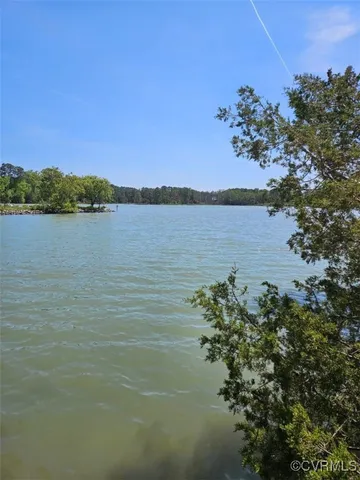a view of a lake with a mountain in the background