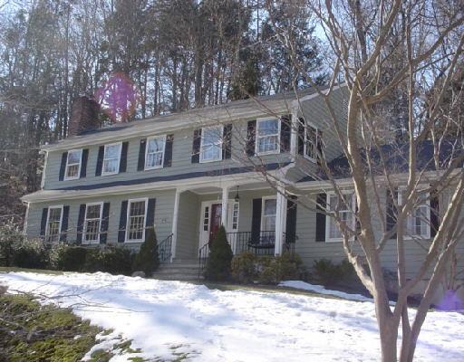28 Ridge Tree Lane Stamford, CT 06903 - Photo 1 of 1 a front view of a house with a yard