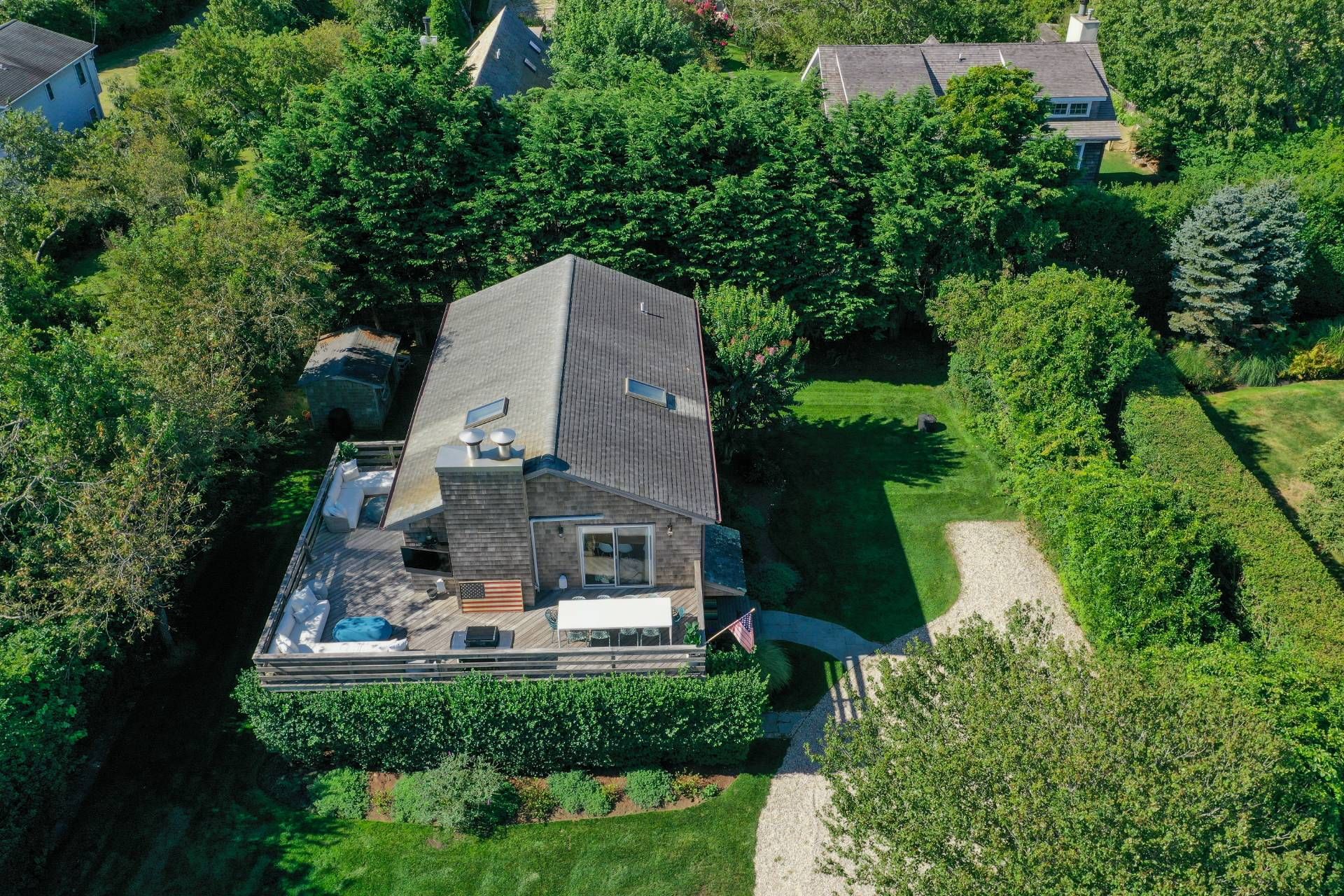 28 Ditch Plains Road Montauk, NY 11954 - Photo 28 of 30 an aerial view of a house with a garden and a houses