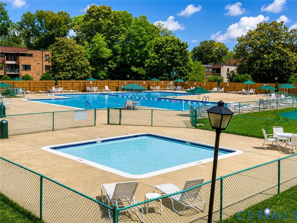 1507 Bronwyn Road, Unit T3 Henrico, VA 23238 - Photo 35 of 42 Outdoor swimming pool area with concrete decking a