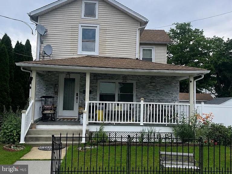 Charming home with inviting porch.