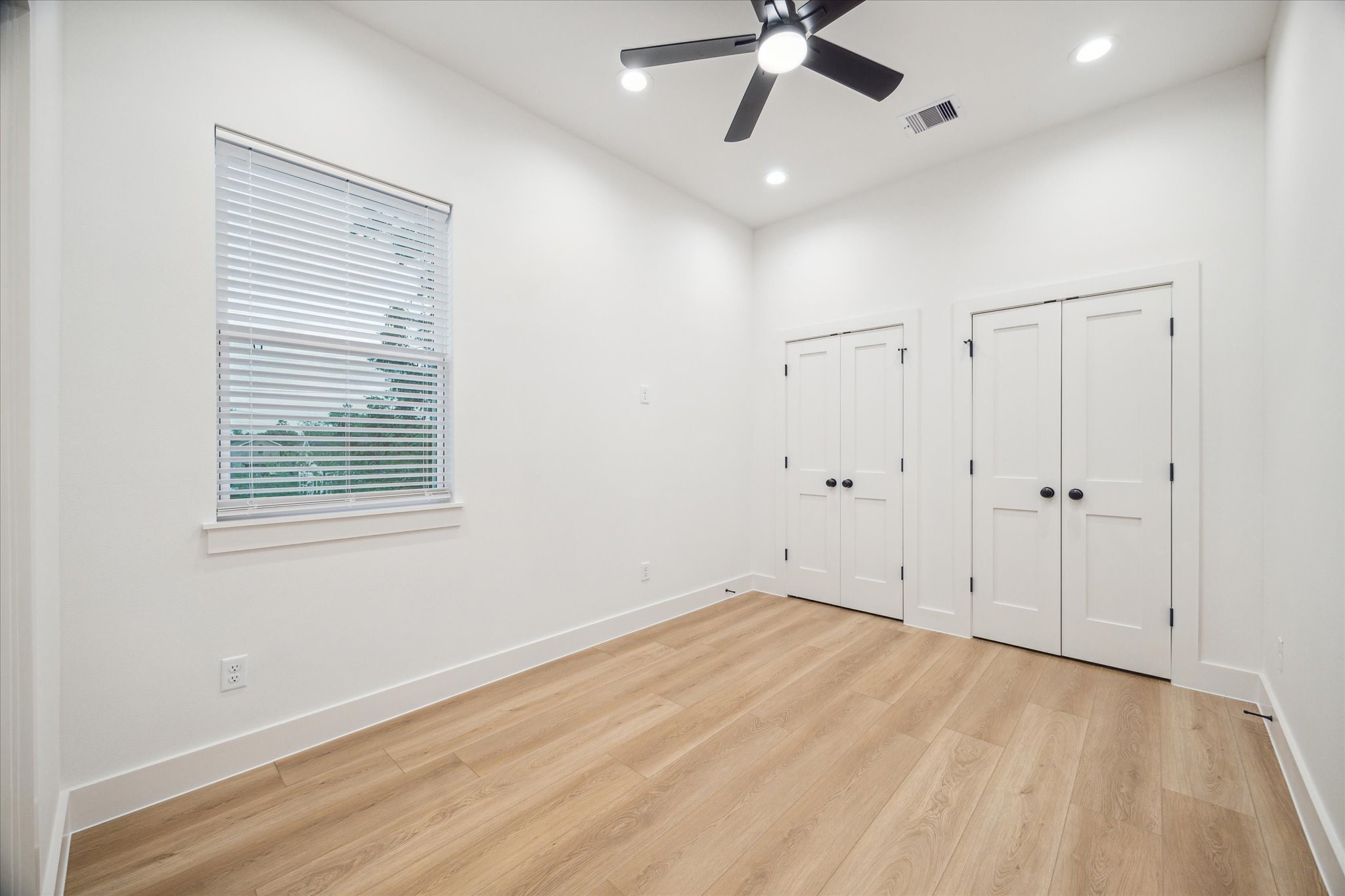 3506 Delhi Street, Unit A Houston, TX 77022 - Photo 13 of 15 a view of an empty room with a window