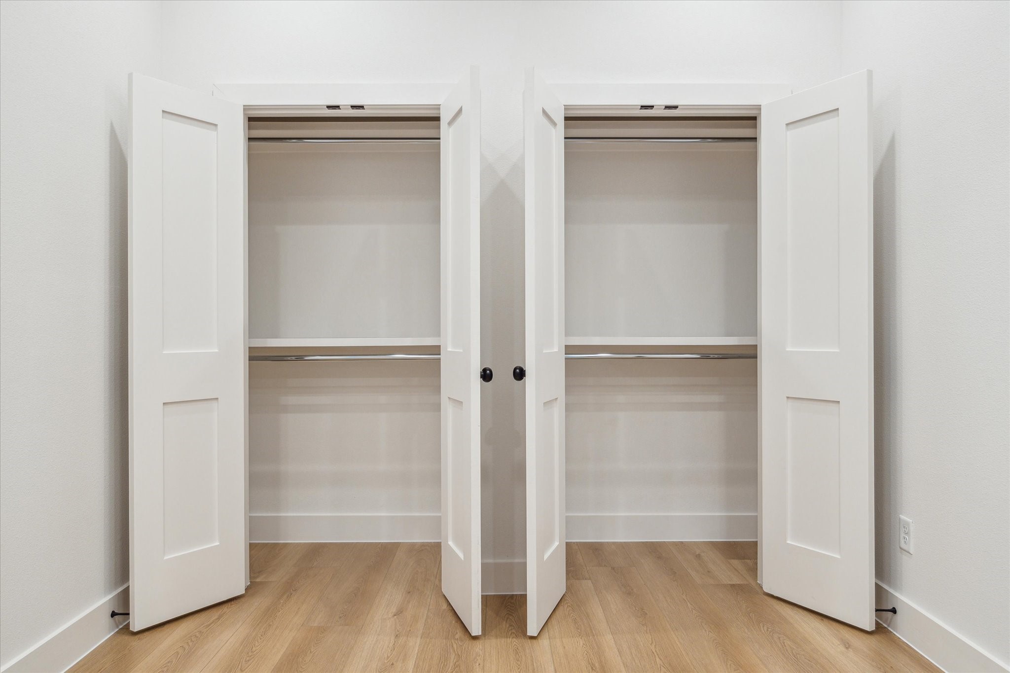 3506 Delhi Street, Unit A Houston, TX 77022 - Photo 14 of 15 a view of walk in closet with empty racks