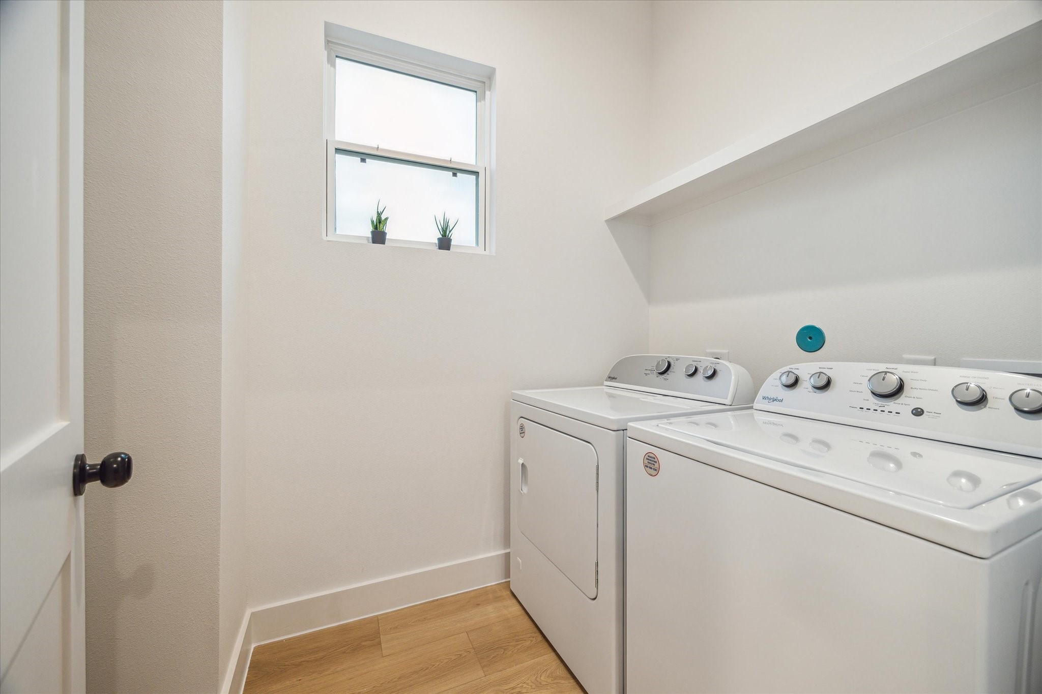 3506 Delhi Street, Unit A Houston, TX 77022 - Photo 15 of 15 a utility room with dryer and washer