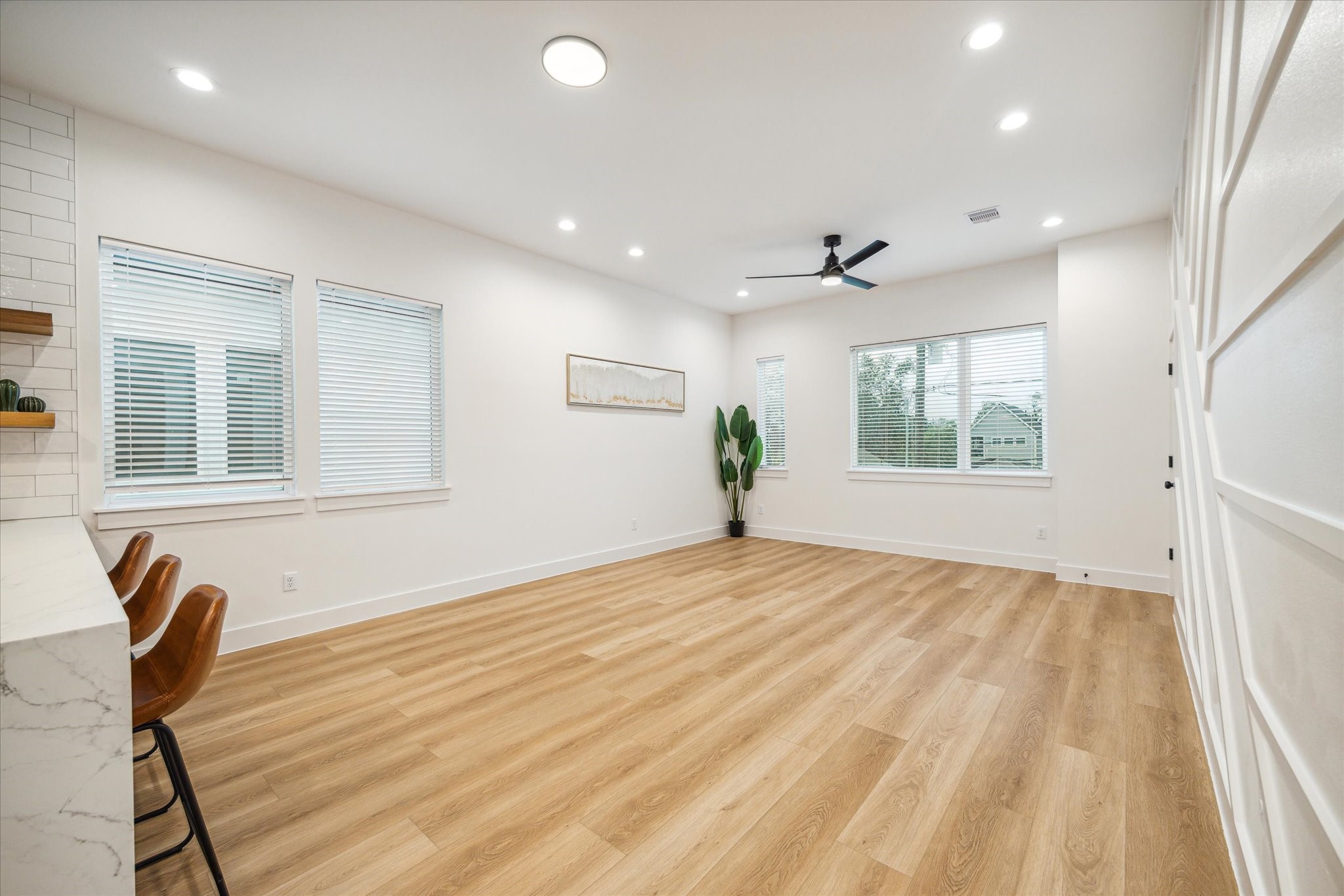 3506 Delhi Street, Unit A Houston, TX 77022 - Photo 3 of 15 a view of empty room with wooden floor and fan