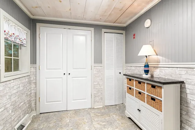 a kitchen with stainless steel appliances a refrigerator sink and cabinets