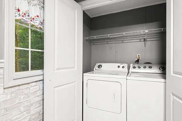 a porch with wooden floor and fence