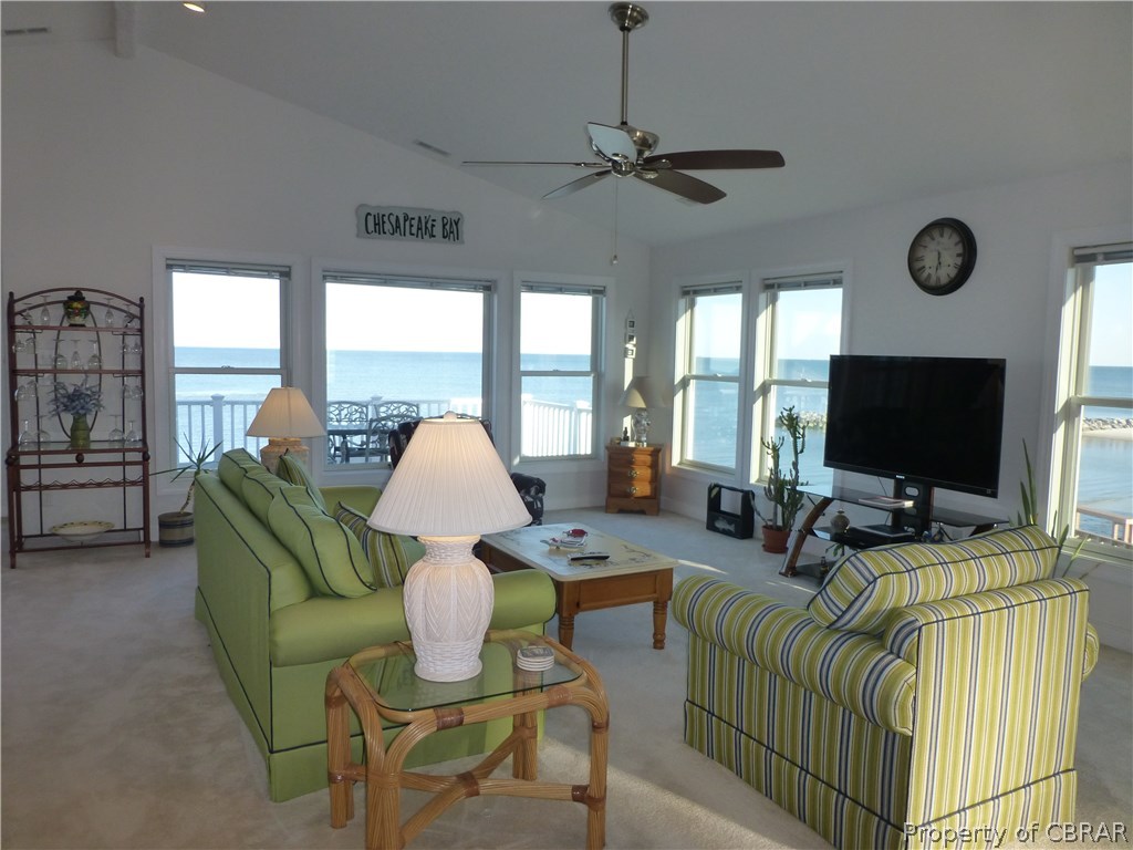 8 Chesapeake Shore Road Port Haywood, VA 23138 - Photo 5 of 26 Living Room on 3rd level with expansive views over Chesapeake Bay! Vaulted Ceiling, opens to Deck!