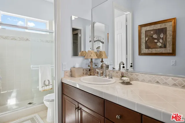 a view of swimming pool with a table and chairs