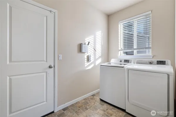 a bathroom with a sink a vanity and a mirror