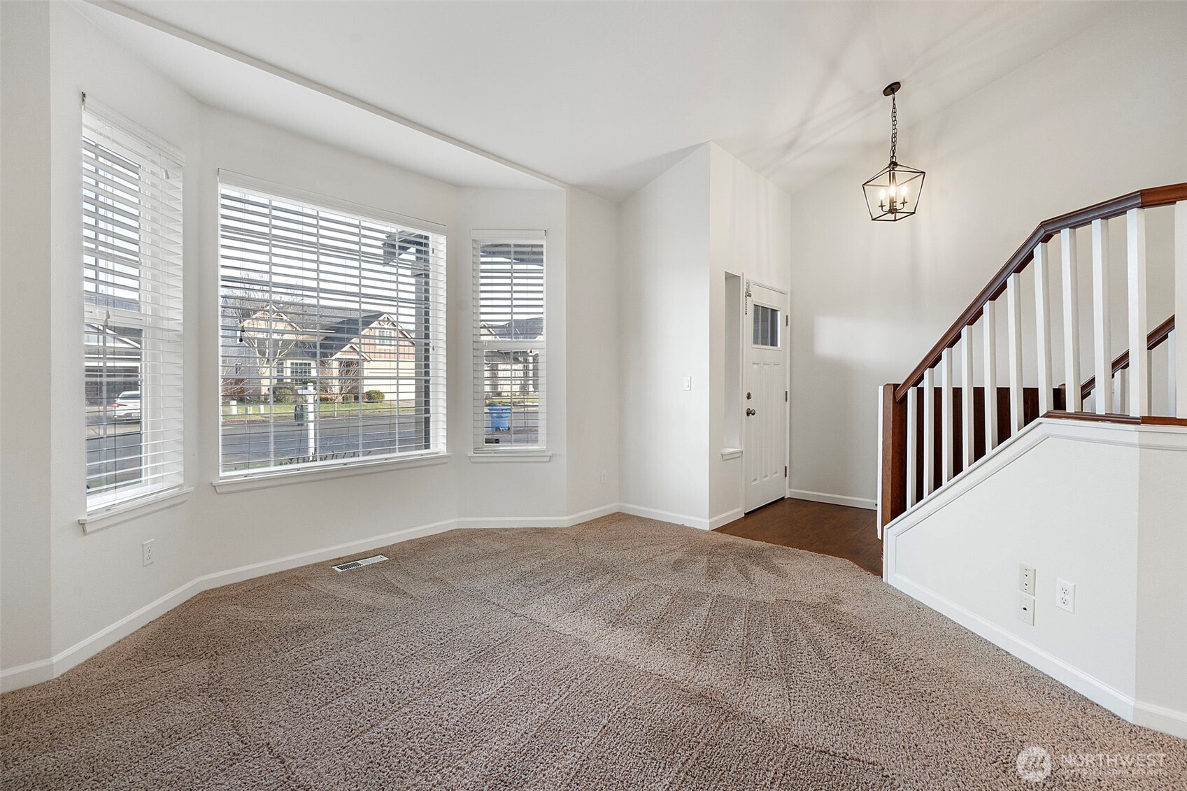204 Balmer Street Southwest Orting, WA 98360 - Photo 3 of 29 a view of an empty room with a window