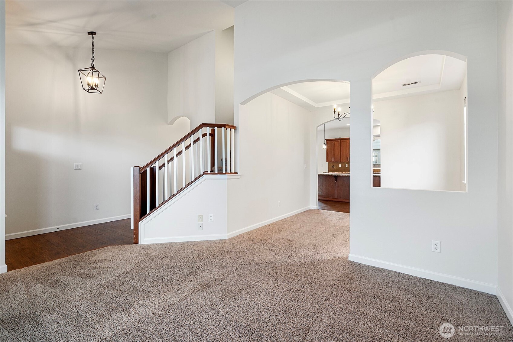 204 Balmer Street Southwest Orting, WA 98360 - Photo 4 of 29 a view of a hallway with entryway and stairs