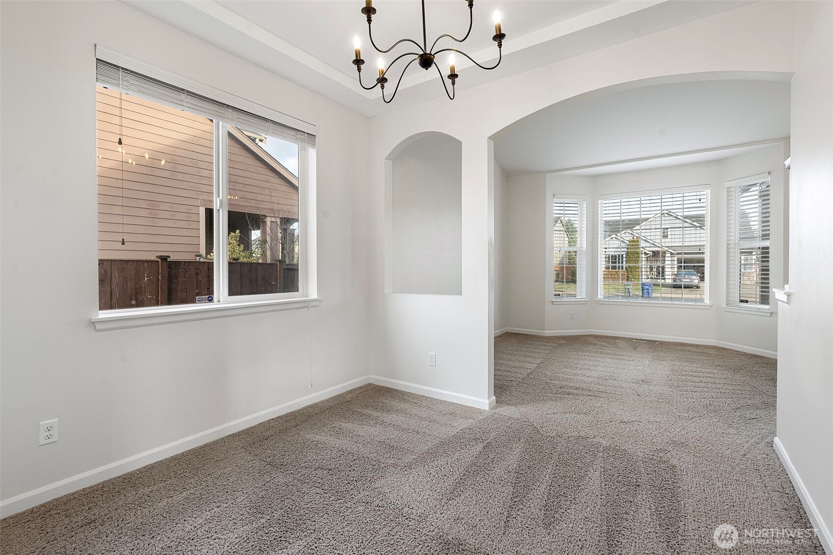 204 Balmer Street Southwest Orting, WA 98360 - Photo 5 of 29 a view of an empty room with a window