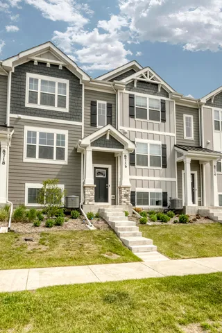 a front view of a building with a swimming pool