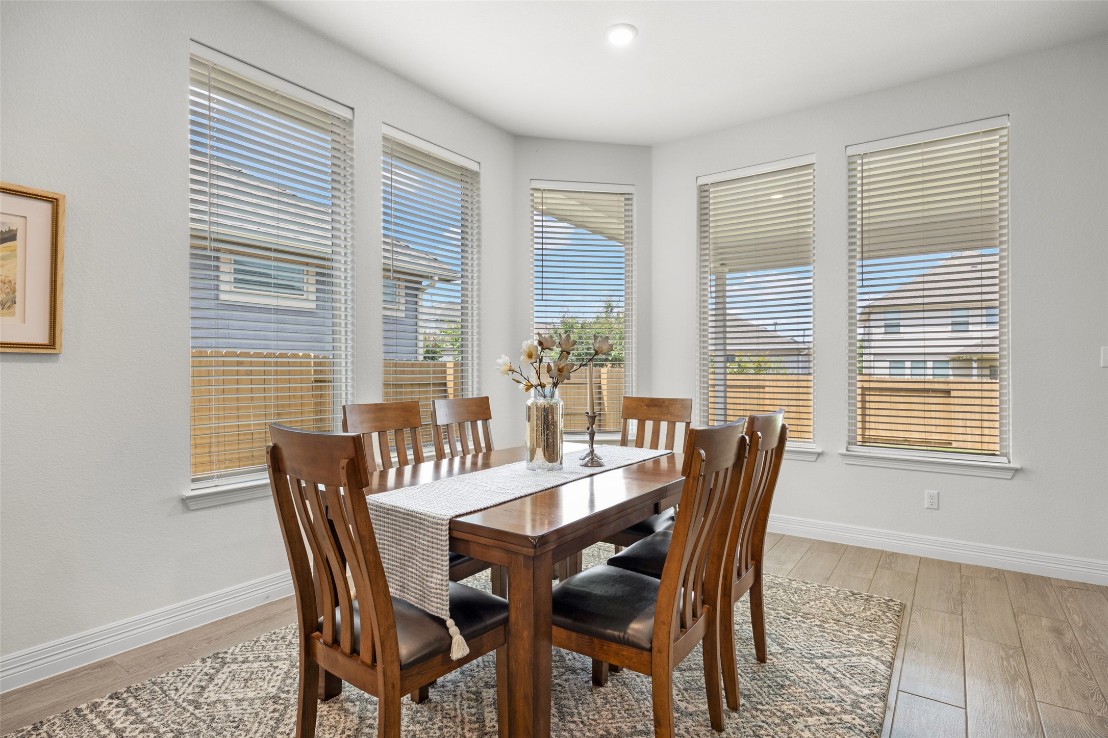 704 Muster Bend Georgetown, TX 78626 - Photo 12 of 38 Dining area featuring light wood-type flooring and baseboards