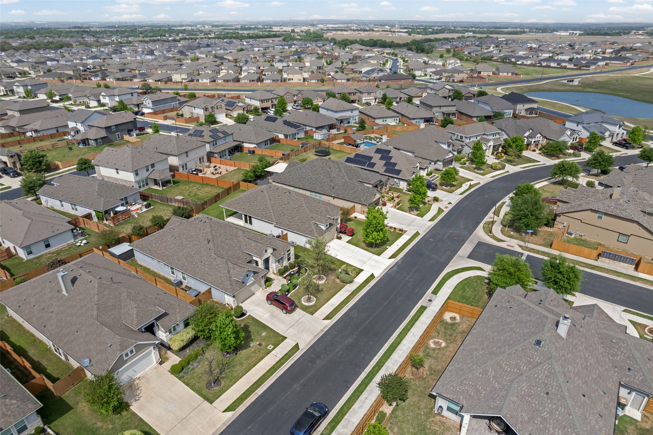 704 Muster Bend Georgetown, TX 78626 - Photo 36 of 39 Aerial view of property and surrounding area featuring nearby suburban area
