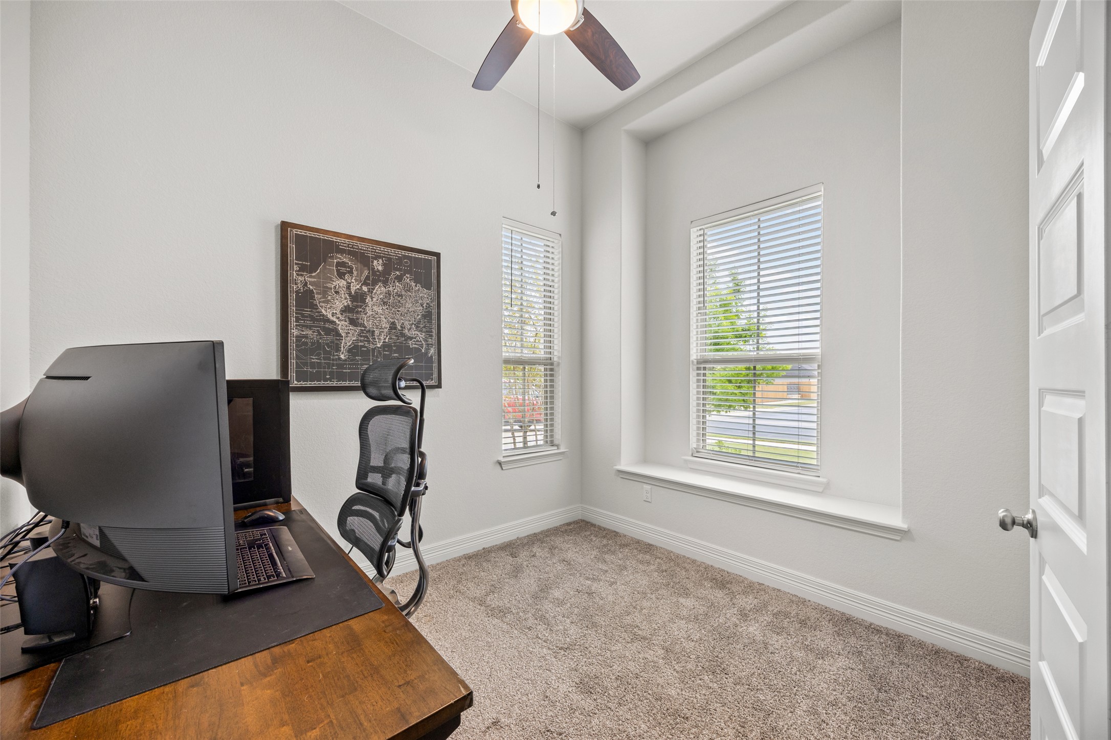 704 Muster Bend Georgetown, TX 78626 - Photo 4 of 38 Office space featuring light carpet and ceiling fan