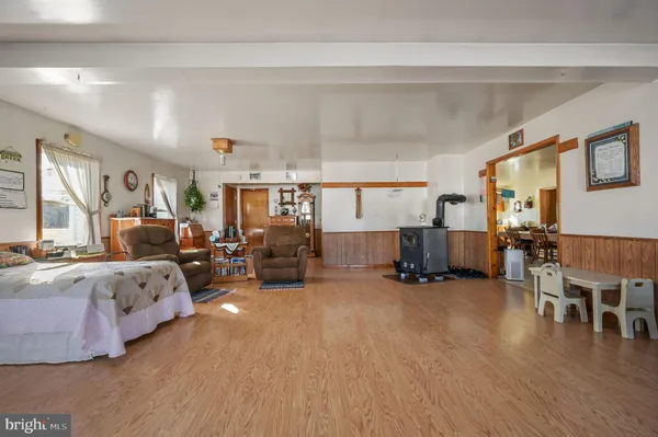 a bed room with furniture and a window