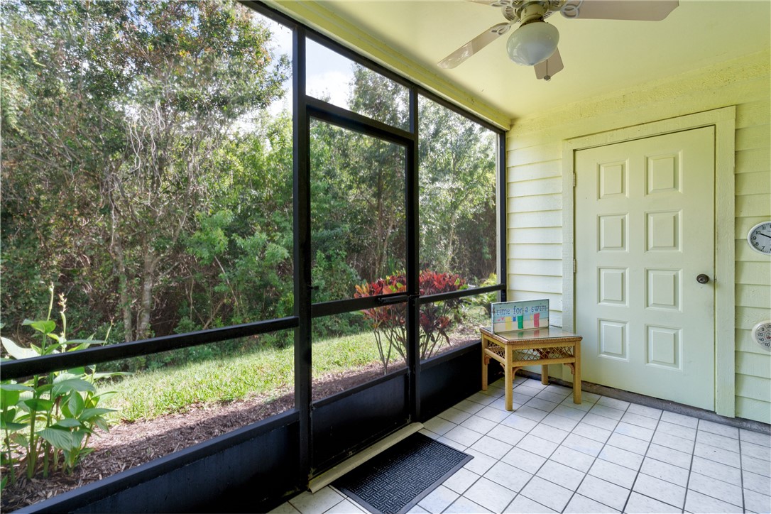 9645 Estuary Way, Unit 1 Sebastian, FL 32958 - Photo 22 of 36 a building outdoor space with seating area and garden view