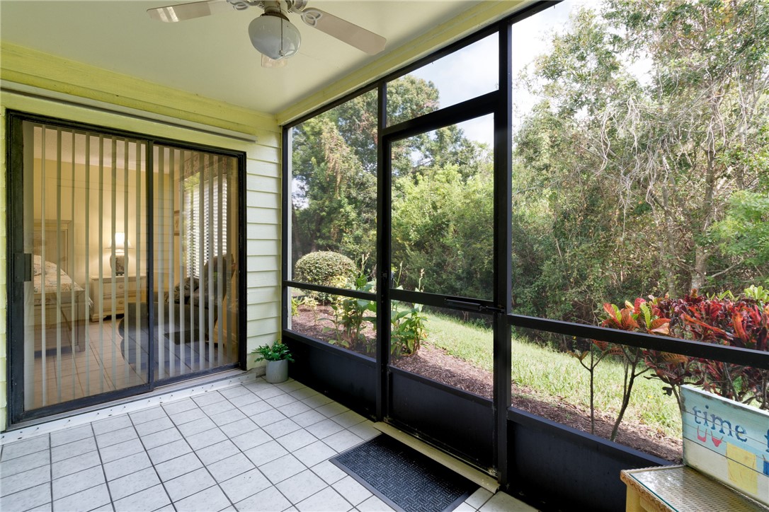 9645 Estuary Way, Unit 1 Sebastian, FL 32958 - Photo 23 of 36 a view of a porch with furniture