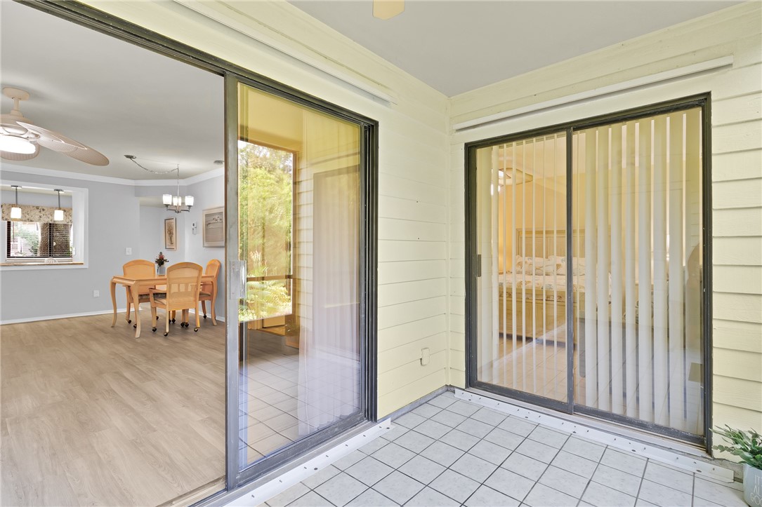 9645 Estuary Way, Unit 1 Sebastian, FL 32958 - Photo 24 of 36 a view of an entryway with wooden floor and a livingroom