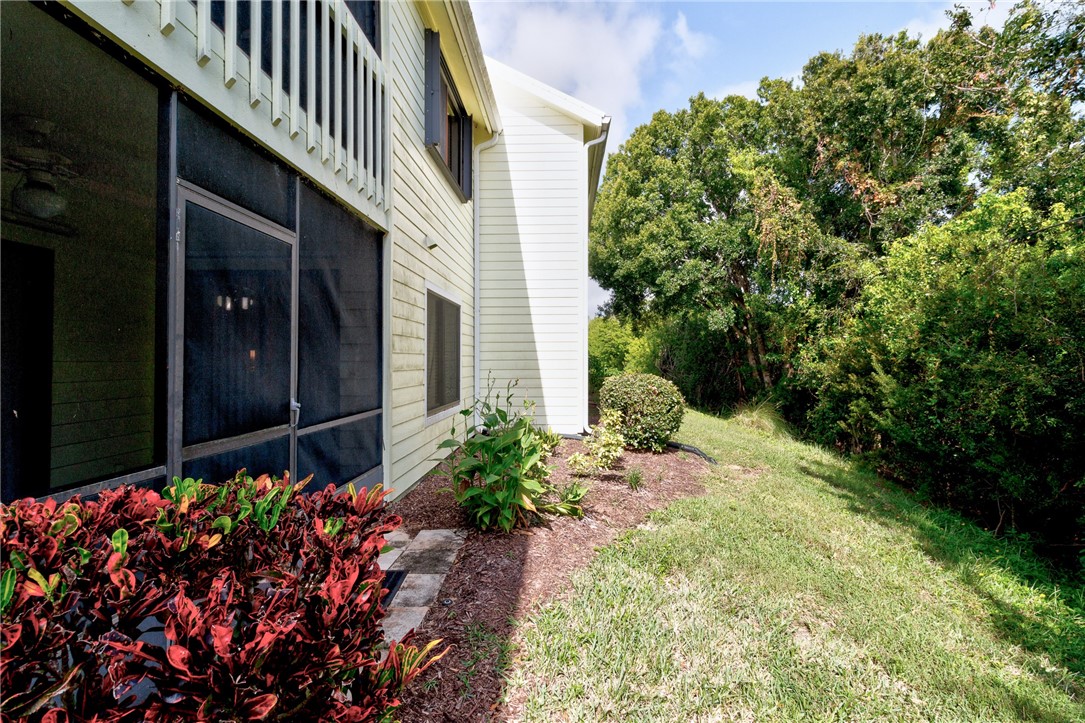 9645 Estuary Way, Unit 1 Sebastian, FL 32958 - Photo 25 of 36 a bunch of flowers in front of flowers