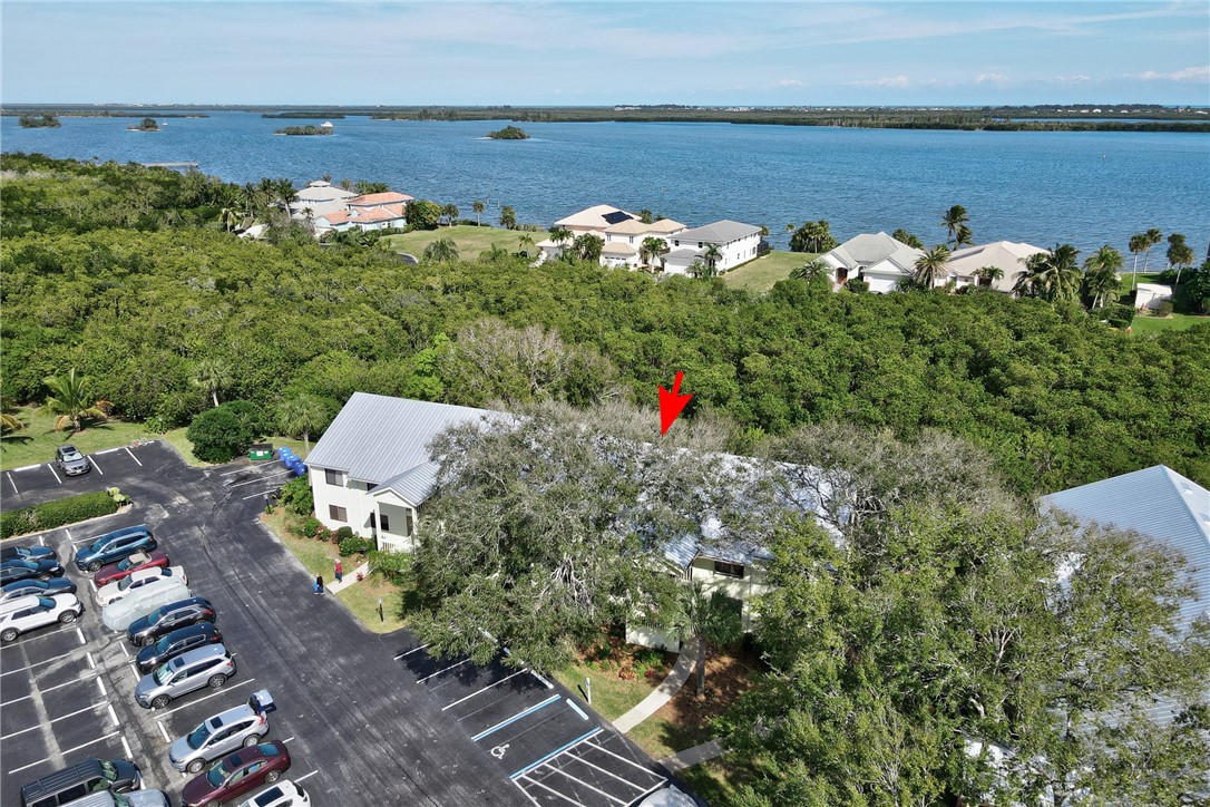 9645 Estuary Way, Unit 1 Sebastian, FL 32958 - Photo 28 of 36 an aerial view of a houses with outdoor space
