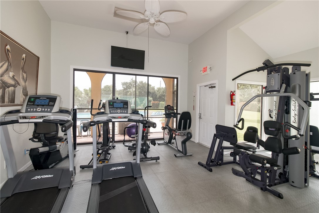 9645 Estuary Way, Unit 1 Sebastian, FL 32958 - Photo 36 of 36 a view of a room with gym equipment