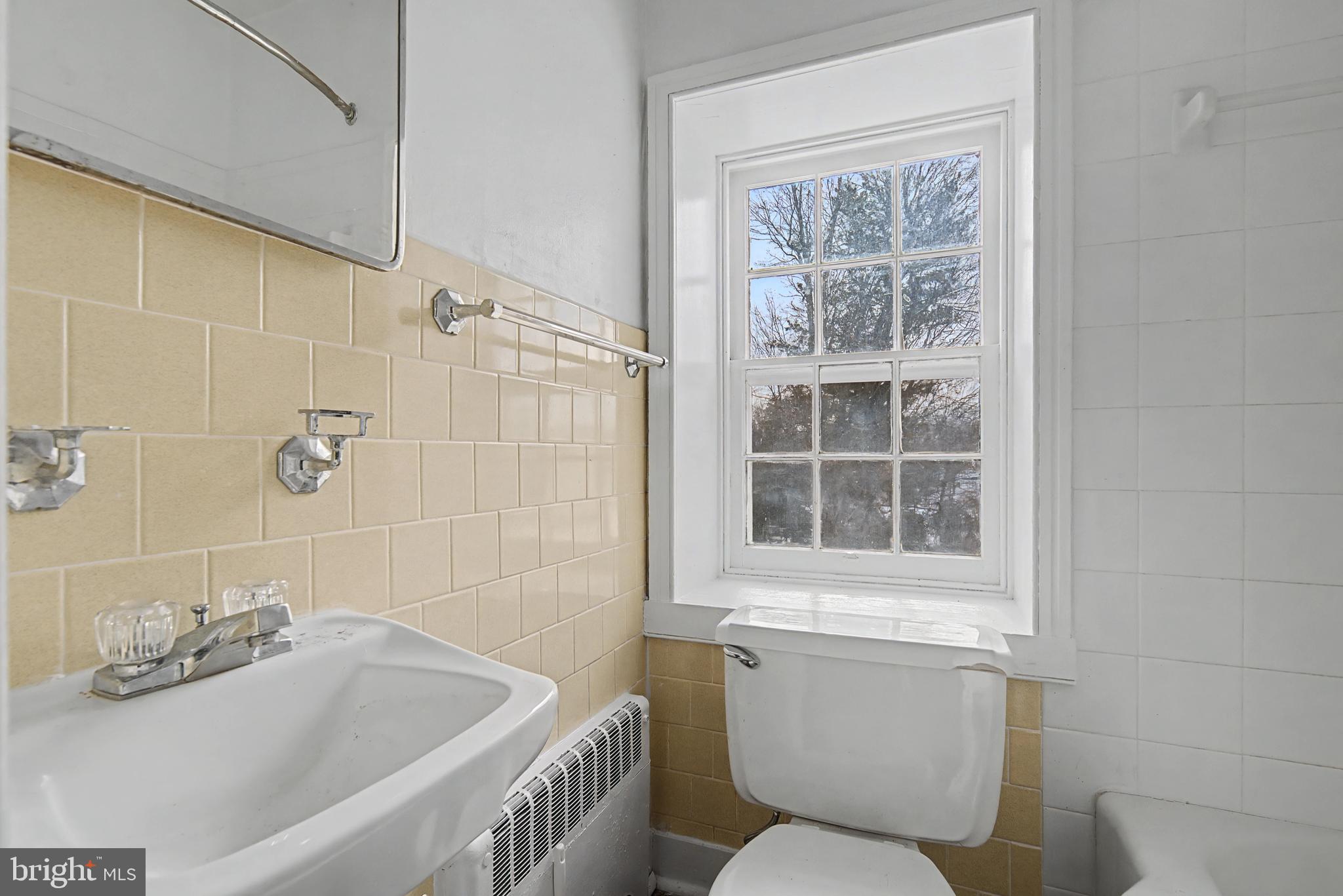 1776 Atlas Drive Frederick, MD 21702 - Photo 31 of 54 a bathroom with a sink and a toilet