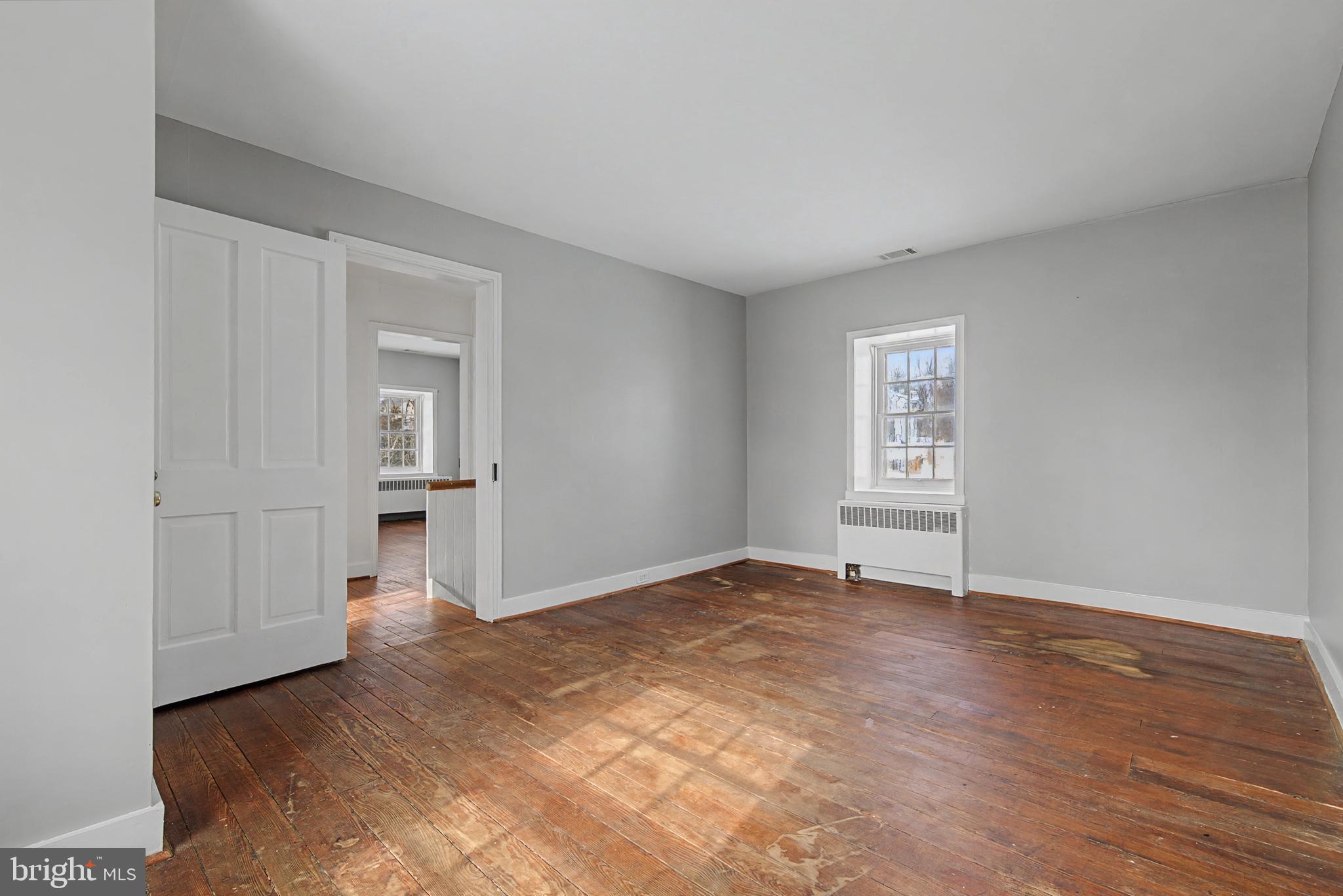1776 Atlas Drive Frederick, MD 21702 - Photo 33 of 54 an empty room with windows and entrance